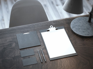 Black mockup on the wooden table. 3d rendering