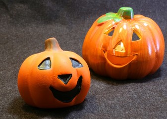 two jack o lantern symbols of Halloween