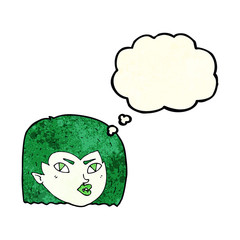 cartoon vampire face with thought bubble