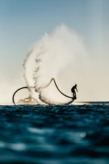 Wall murals Water Motor sports Silhouette of a fly board rider