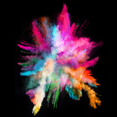 Launched colorful powder on black background