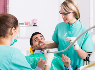 Fototapeta premium Dentist and scared patient .