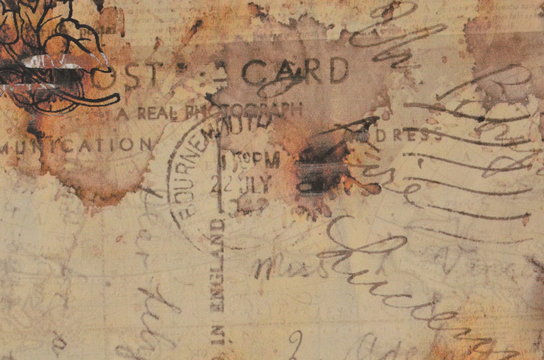 An old vintage postcard. Grungy and blurry background.