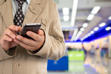 Business man in shopping mall.