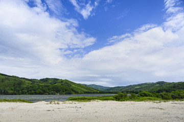 The surface of the lake. 
The surface of a mountain lake on a windy day .