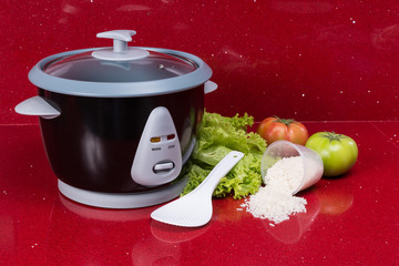 Electric rice cooker, in the kitchen red in modern home