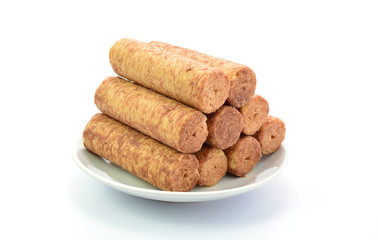 roll coated chocolate on white plate