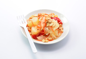 pomelo and salad on white background