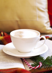 Cup of coffee and book