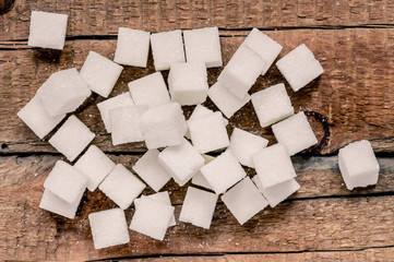 On the table refined sugar cubes