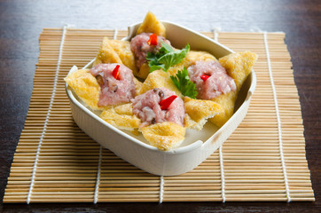 Tofu puff filled with filled with meat paste