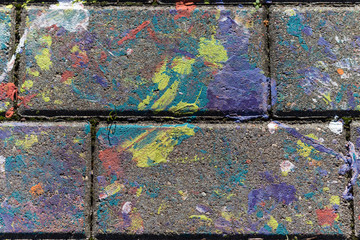 colored stains of paint on a slab