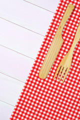 Kitchenware on red towel