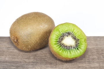 Fresh kiwi fruits on wooden