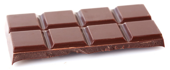 Black chocolate piece isolated on white background