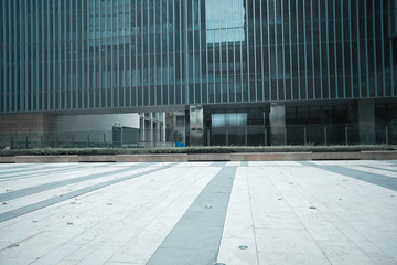 Empty road floor with modern building background