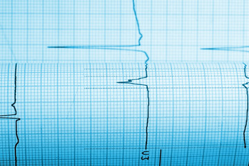 Paper with curve of a seismograph