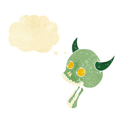 cartoon spooky skull with thought bubble