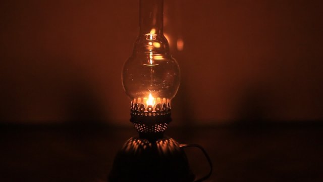Burning kerosene lamp