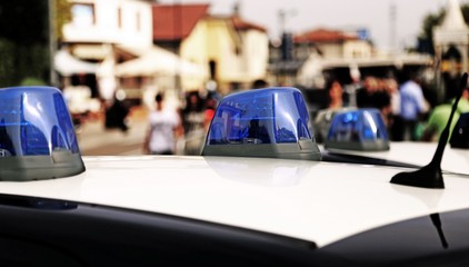 police car while patrolling in the city