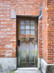 Wooden door on Brick wall architecture details