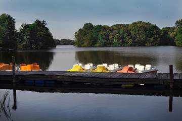 empty pedal boats in autumn
