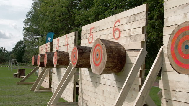 Big logs on the wall for an axe competition. It is the throwing of axe as a part of the holiday