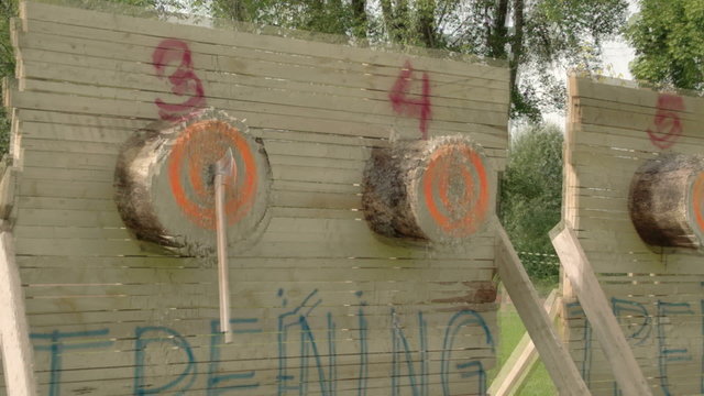 Two axes was thrown at log numbers 3 and 4. It is an axe throwing competition currently happening
