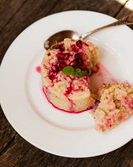 Rice pudding with pomegranate sauce