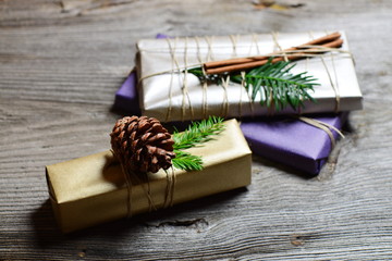 Stylish & Vintage christmas gifts box presents on the old wooden table