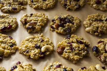 Fresh homemade raisin cookies on baking sheet, fill out