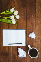 White flowers and a cup of coffee