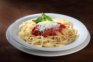Italian dish of spaghetti with tomato and basil