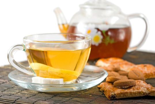 image of cup of tea, and biscuits closeup