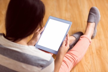 Asian woman using tablet with copy space