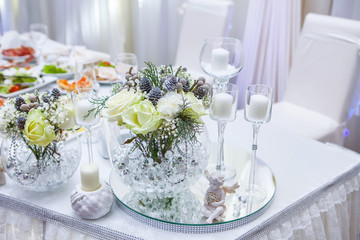 Table decor with flowers table numbers and candles