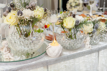 Table decor with flowers table numbers and candles