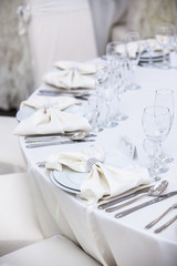 Elegant tables set up for a wedding banquet
