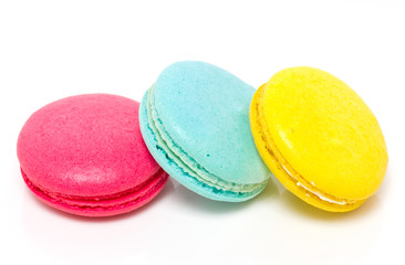 Colorful three macaroons isolated on white.