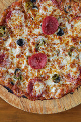 Closeup pepperoni flat bread pizza top