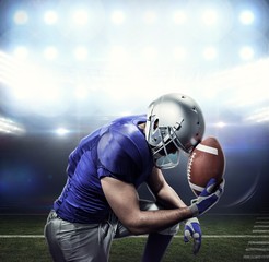 Composite image of upset american football player with ball