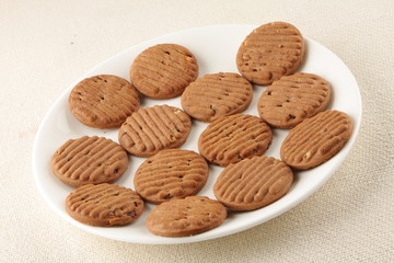 Chocolate chip cookies on a white plate