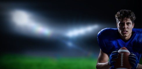 Composite image of aggressive american football player