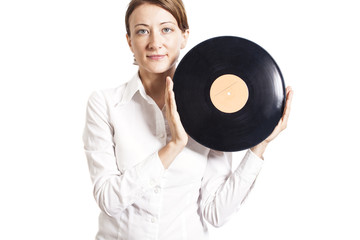 woman holding vinyl record