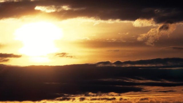 sunset - sun with clouds - sky - closeup