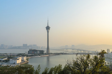 Fototapeta na wymiar Macau tower and sai van bridge in evening at macau china