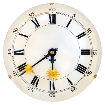 Ancient clock face with small golden sun clock hands