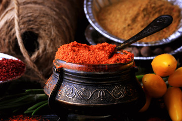 spice red ground pepper old dark wooden background rustic style