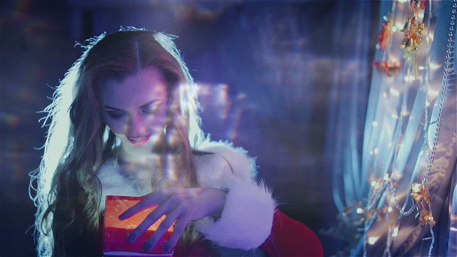 Beautiful girl in shock from a Christmas present