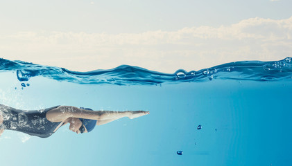 Female swimmer. Concept image